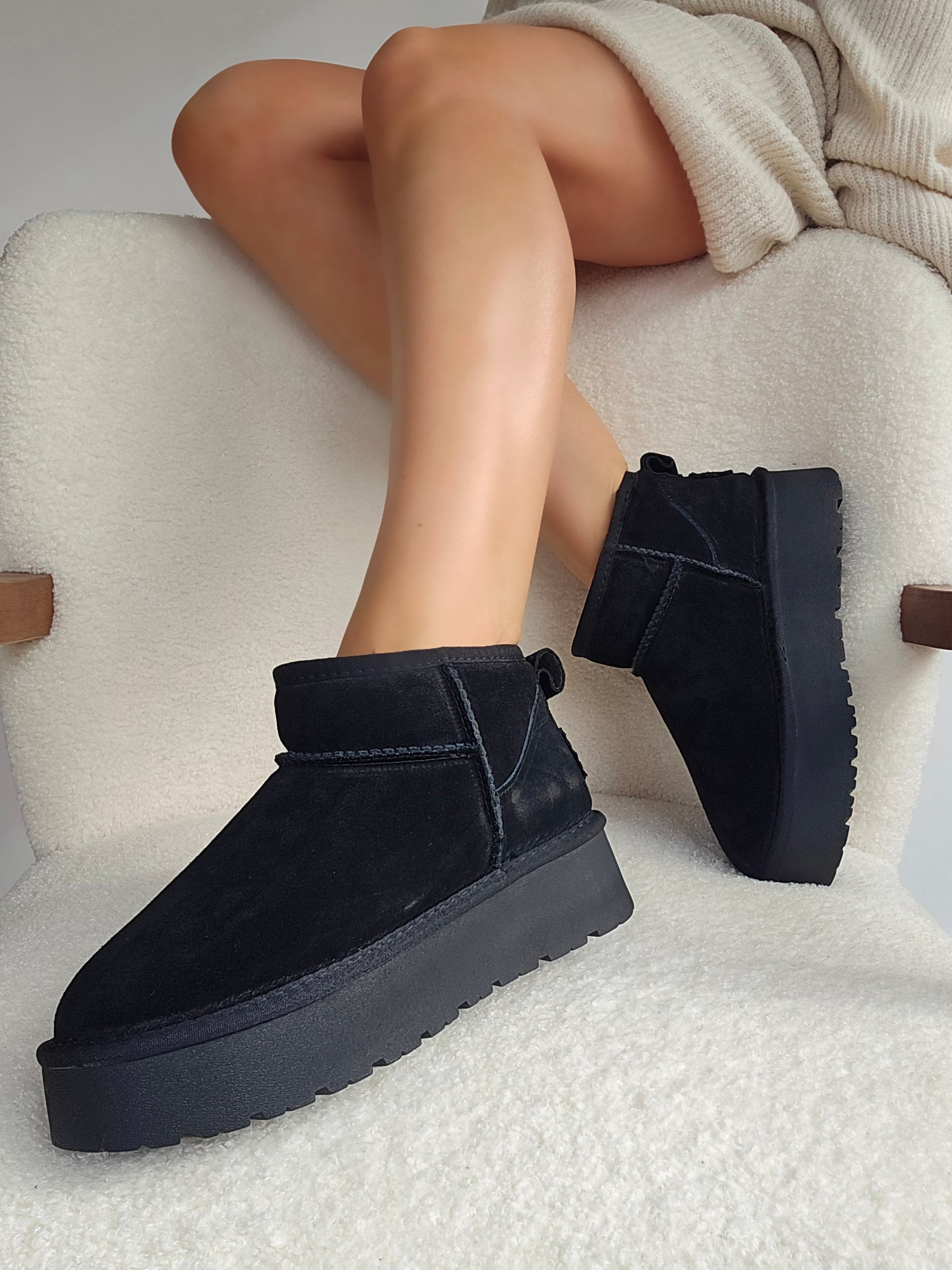 Boots fourrées noires en cuir, semelle plate-forme – Associez confort et tendance