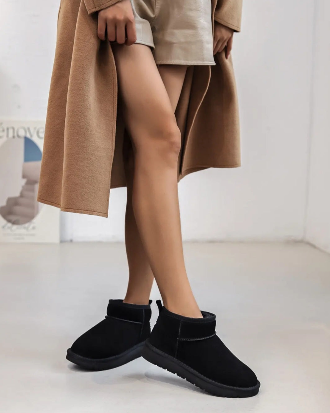 Bottines noires a fourrure interieure pour un confort douillet et elegant.