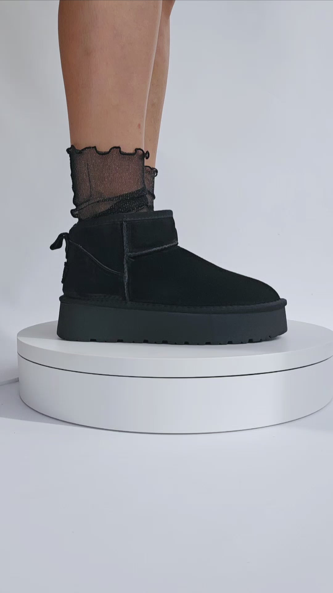 Boots fourrées plate-forme cuir Noir