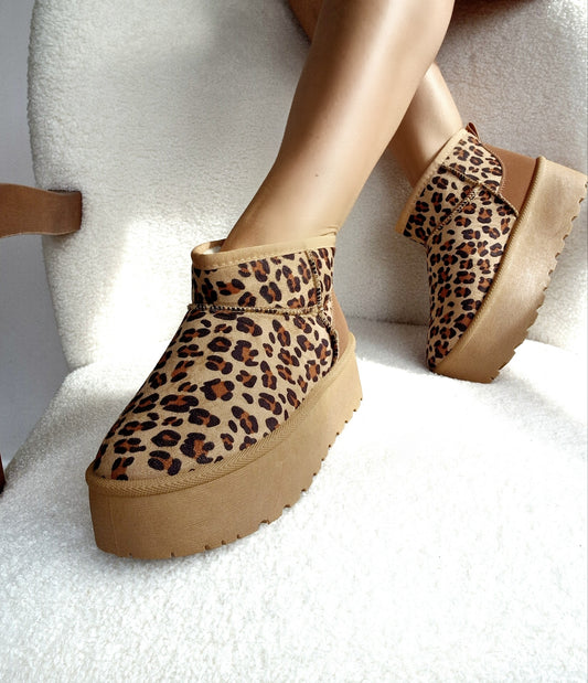 Leopard fur-lined platform boots