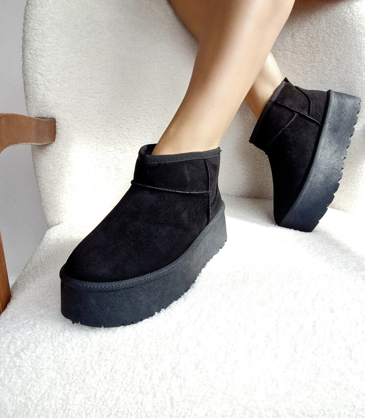 Black fur-lined platform boots
