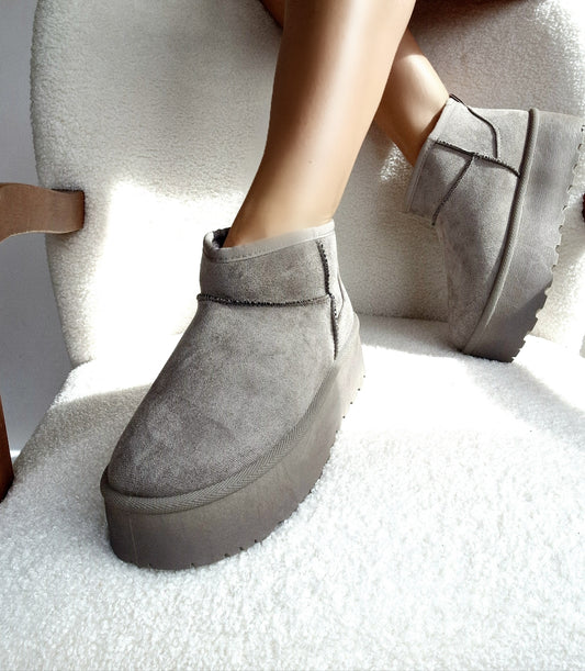 Grey fur-lined platform boots
