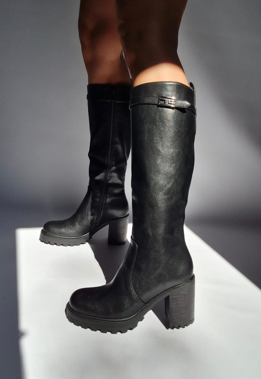 Black square heel cleated boots