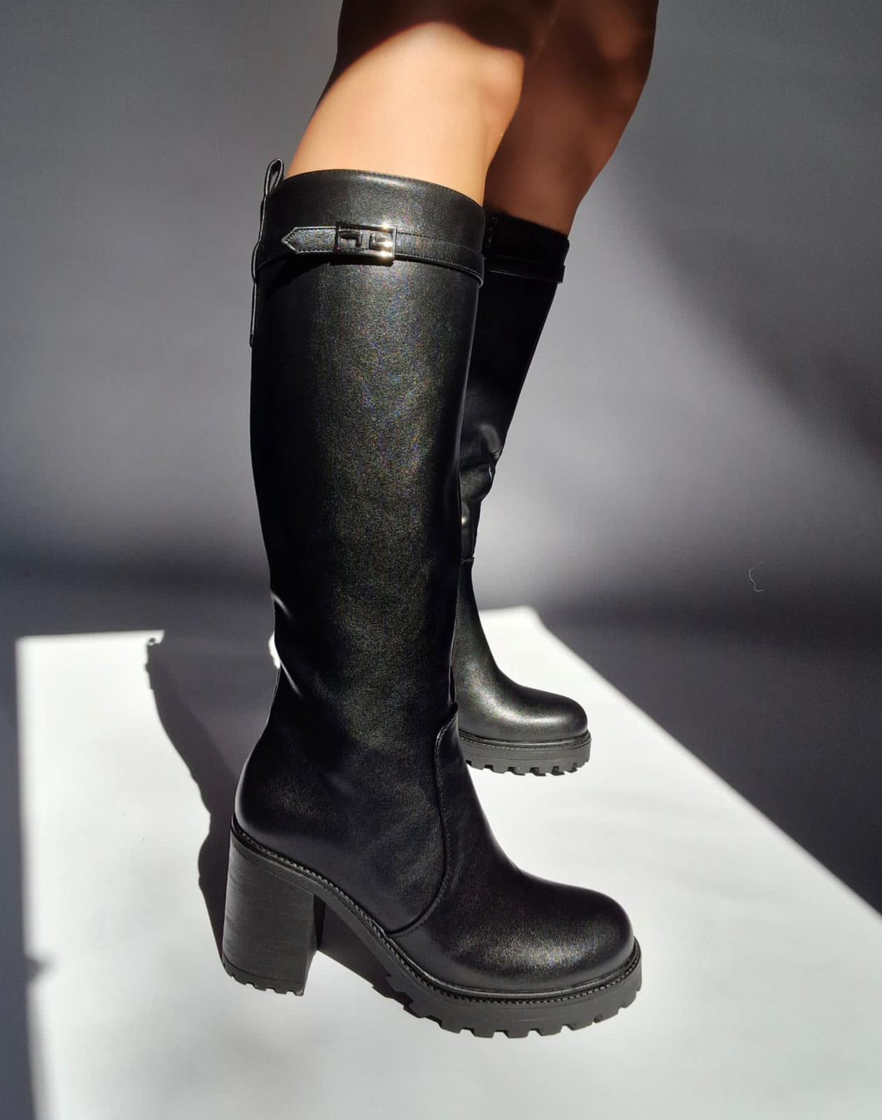 Black square heel cleated boots