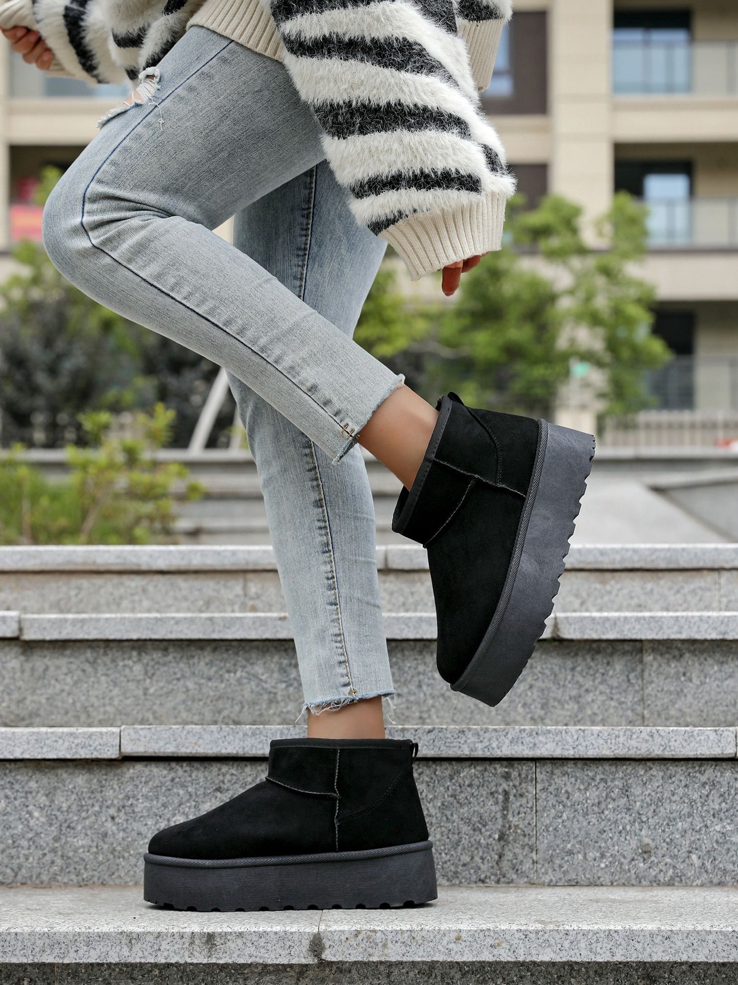 Black fur-lined platform boots