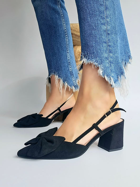 Black pointed toe bow pumps