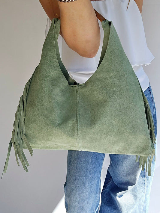Sac Frange porté mains daim Vert