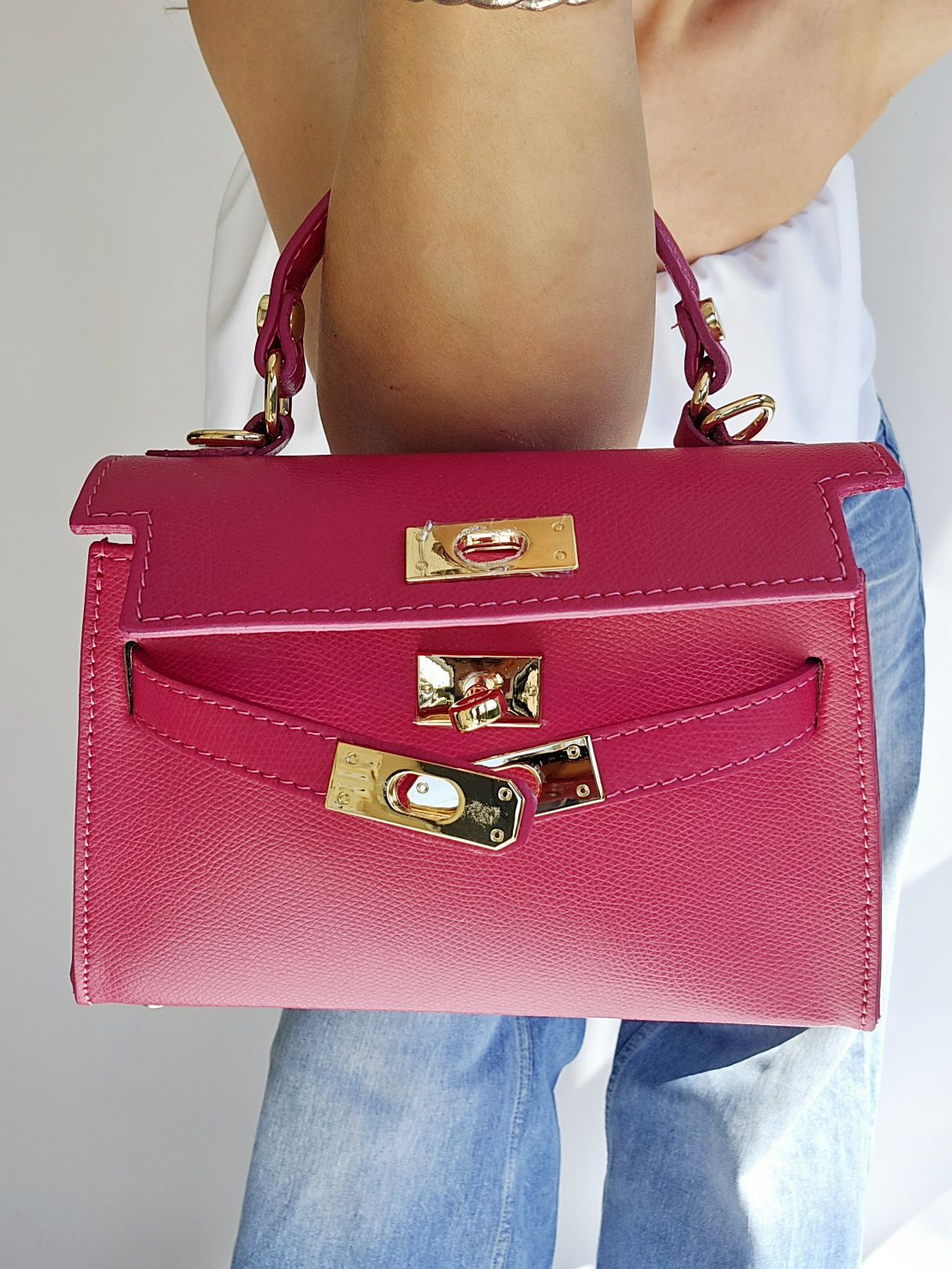 Sac bandouillère Kellie cuir petit modèle Fushia