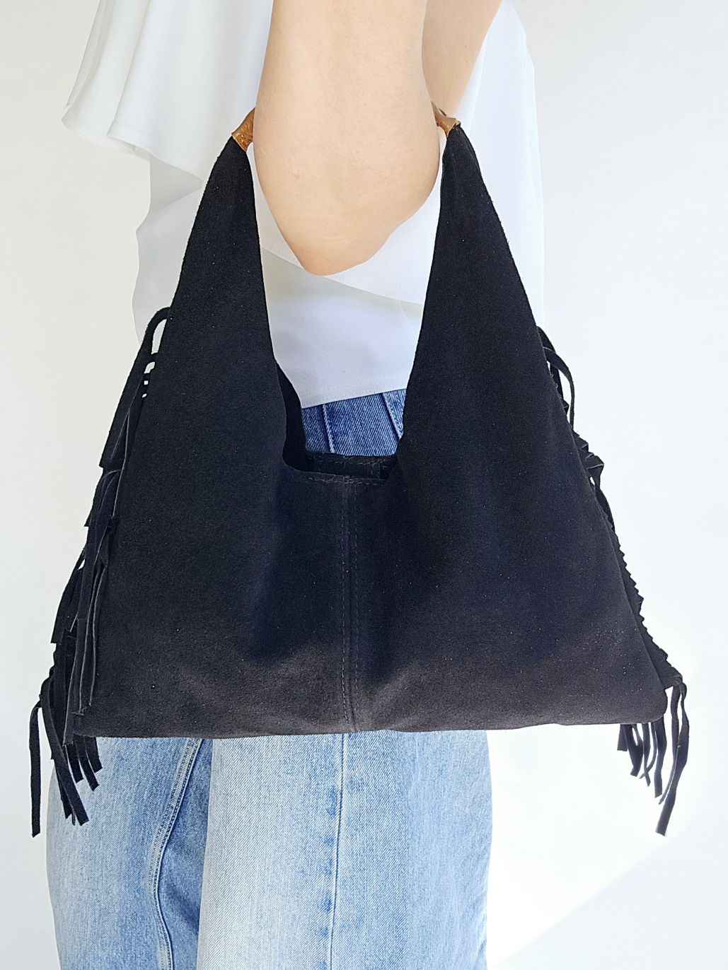 Sac Frange porté mains daim Noir